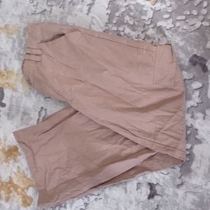 KHAKI CARGO FLARE PANTS.